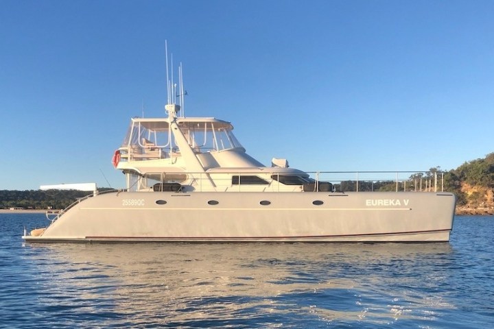 a small boat in a large body of water